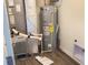 Utility room with a water heater and HVAC system at 4067 Denali Dr, Indianapolis, IN 46235