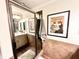 Bathroom with a stand-up shower, stylish vanity, and vintage inspired framed artwork at 430 N Park Ave # 302, Indianapolis, IN 46202