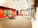 Community room with carpeted floors, kitchenette and a communal dining area at 430 N Park Ave # 302, Indianapolis, IN 46202