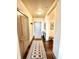 An inviting entryway featuring a decorative rug and minimalist decor elements at 430 N Park Ave # 302, Indianapolis, IN 46202