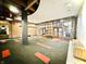 Spacious lobby area with a red and orange carpet and seating at 430 N Park Ave # 302, Indianapolis, IN 46202