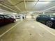 An indoor parking garage with available parking spaces for residents and guests at 430 N Park Ave # 302, Indianapolis, IN 46202