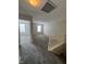 Upstairs hallway with neutral walls, plush carpeting, and access to multiple rooms at 5142 Tuscany Ln, Indianapolis, IN 46254