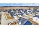 Birds-eye view of homes in the area of the home with an open field in the background at 526 Carroll St, New Whiteland, IN 46184