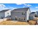 View of home and fenced-in backyard, perfect for entertaining and outdoor activities at 526 Carroll St, New Whiteland, IN 46184