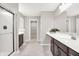 Bathroom showcases a glass enclosed shower, double vanity with a view of the walk-in closet at 526 Carroll St, New Whiteland, IN 46184