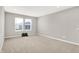 Bedroom with neutral carpet, two windows with blinds, and gray walls at 526 Carroll St, New Whiteland, IN 46184