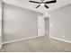 Bedroom featuring neutral walls, carpeted floors, ceiling fan and a doorway leading to other rooms at 526 Carroll St, New Whiteland, IN 46184
