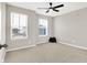 Bedroom featuring neutral walls, carpeted floors, ceiling fan and a double window looking outside at 526 Carroll St, New Whiteland, IN 46184