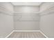 Walk-in closet with carpet and shelving at 526 Carroll St, New Whiteland, IN 46184