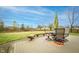 Lovely backyard deck with outdoor furniture, an umbrella, and a view of the lawn at 538 Cyclamen Chase, Westfield, IN 46074