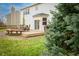 Spacious backyard featuring a wooden deck with outdoor furniture, and lawn at 538 Cyclamen Chase, Westfield, IN 46074