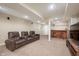 Finished basement featuring theater seating and custom wooden bar at 538 Cyclamen Chase, Westfield, IN 46074