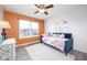 Cozy bedroom with natural light, a ceiling fan, and stylish decor at 538 Cyclamen Chase, Westfield, IN 46074