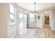 Light-filled dining area with sliding glass doors leading to the patio, ideal for indoor-outdoor living at 538 Cyclamen Chase, Westfield, IN 46074
