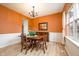 Dining room featuring hardwood floors, chandelier, wainscoting, and a large window at 538 Cyclamen Chase, Westfield, IN 46074