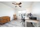 Bright office with a ceiling fan, a desk, and a comfortable rocking chair at 538 Cyclamen Chase, Westfield, IN 46074
