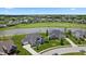Gorgeous home with lush landscaping, water view, and access to a golf course community at 565 Old Ashbury Rd, Westfield, IN 46074