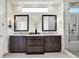Modern bathroom featuring dual sinks, a marble countertop, and a frameless glass shower at 565 Old Ashbury Rd, Westfield, IN 46074