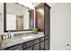 Bathroom with granite counters, a decorative mirror and vanity, and lots of storage at 565 Old Ashbury Rd, Westfield, IN 46074