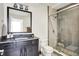 Elegant bathroom with a glass-enclosed shower, modern vanity, and stylish fixtures at 565 Old Ashbury Rd, Westfield, IN 46074