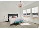 Bright bedroom with large windows, plush carpeting, and modern furnishings at 565 Old Ashbury Rd, Westfield, IN 46074