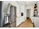 Bright kitchen with stainless steel fridge and built-in appliances at 565 Old Ashbury Rd, Westfield, IN 46074
