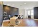 Bright office area with textured walls, modern desk, zebra rug, and decorative display shelving at 565 Old Ashbury Rd, Westfield, IN 46074