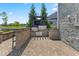 Outdoor kitchen featuring a built-in grill, brick surround and views of the water at 565 Old Ashbury Rd, Westfield, IN 46074