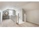 Spacious bedroom with a pitched ceiling, carpeted floors, and lots of natural light at 6189 Primrose Ave, Indianapolis, IN 46220