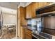 Convenient kitchen layout with stainless steel appliances and easy access to the dining room at 6189 Primrose Ave, Indianapolis, IN 46220