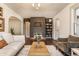 Stylish living room featuring hardwood floors, neutral tones, and an inviting atmosphere at 6189 Primrose Ave, Indianapolis, IN 46220