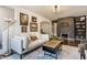 Comfortable living room boasts stylish decor, a cozy fireplace, and an open layout at 6189 Primrose Ave, Indianapolis, IN 46220