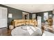 Inviting living room with stylish seating, a round rug, and modern decor accents at 6189 Primrose Ave, Indianapolis, IN 46220