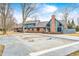 Expansive backyard featuring a large home, a basketball hoop and a covered pool at 690 N 600 W, Lebanon, IN 46052