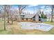 Exterior photo of the home's back exterior featuring a deck and an inground pool at 690 N 600 W, Lebanon, IN 46052