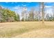 A large backyard with trees and grass at 690 N 600 W, Lebanon, IN 46052