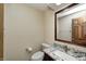 Bathroom features decorative mirror and sink with marble countertop at 690 N 600 W, Lebanon, IN 46052