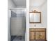 Updated bathroom features a glass door shower at 690 N 600 W, Lebanon, IN 46052