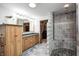 Bathroom with double vanity, stone shower, and ample storage at 690 N 600 W, Lebanon, IN 46052