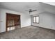 Upstairs bedroom with a ceiling fan, large window, and beautiful stairway views at 690 N 600 W, Lebanon, IN 46052