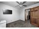 Bedroom features a flat screen TV and ceiling fan at 690 N 600 W, Lebanon, IN 46052
