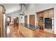 Well-equipped kitchen with a center island, stainless steel appliances, and breakfast nook at 690 N 600 W, Lebanon, IN 46052