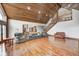 Spacious living room with a wooden ceiling, wooden floors, and large windows at 690 N 600 W, Lebanon, IN 46052