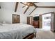 Bedroom with an ensuite bathroom featuring an open doorway at 690 N 600 W, Lebanon, IN 46052