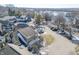 Aerial view of a neighborhood in a beautiful location with a lake and tree lined streets at 7779 Harbour # 51, Indianapolis, IN 46240