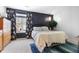 This bedroom is a tranquil retreat, featuring a cozy window seat and stylish floral curtains at 7779 Harbour # 51, Indianapolis, IN 46240
