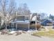 Charming townhouse exterior with a two-car garage, beautiful siding, and a paved driveway at 7779 Harbour # 51, Indianapolis, IN 46240