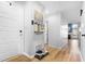Bright entryway featuring modern decor and wood-look flooring at 7779 Harbour # 51, Indianapolis, IN 46240