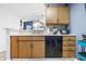 Traditional kitchen featuring wood cabinets and a view of the dining area at 7779 Harbour # 51, Indianapolis, IN 46240